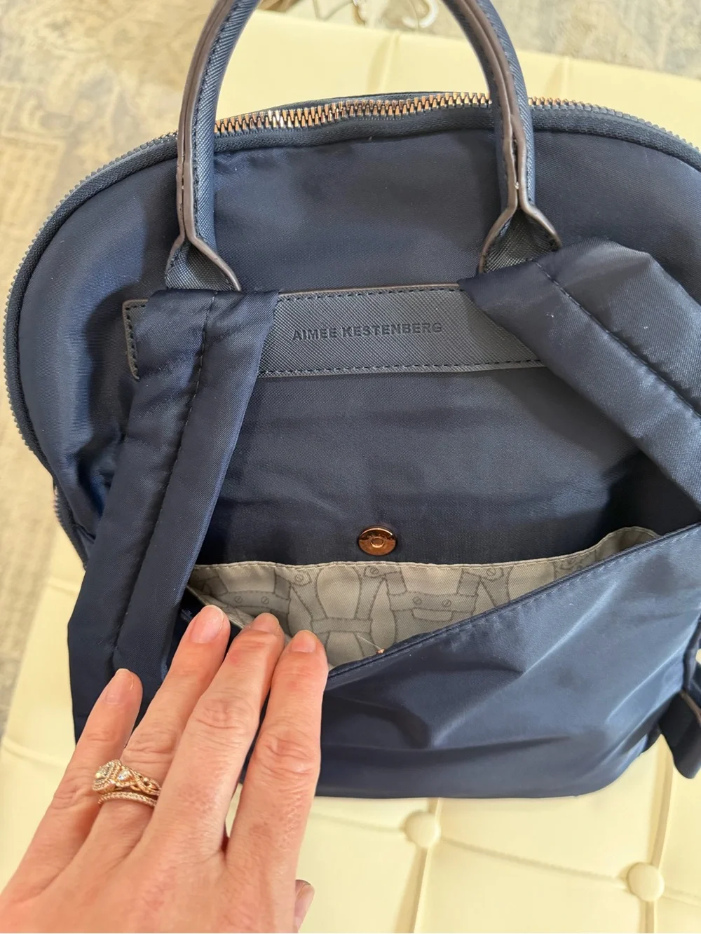 Aimee Kestenberg Navy Backpack with Rose Gold Accents